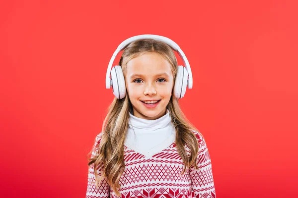 Front View Smiling Kid Sweater Listening Music Headphones Isolated Red — Stock Photo, Image