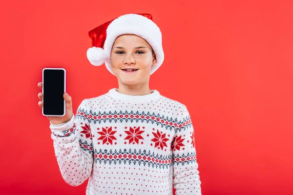 Vooraanzicht Van Lachend Kind Santa Hat Houden Smartphone Met Blanco — Stockfoto