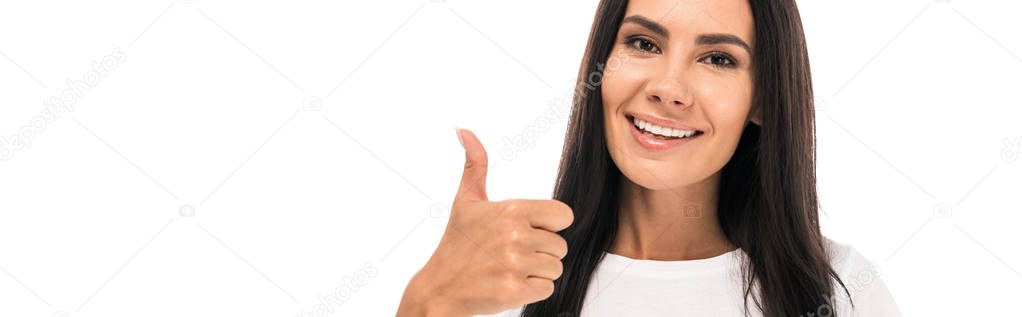 panoramic shot of happy woman showing thumb up isolated on white 