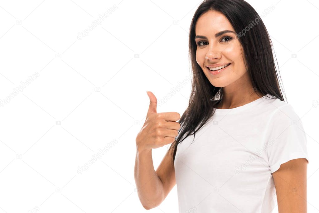 happy woman showing thumb up and smiling isolated on white 