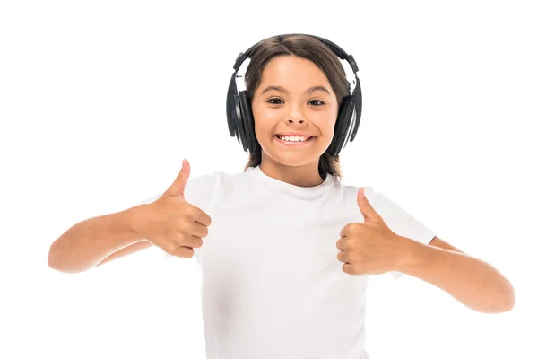 Счастливый Ребенок Слушает Музыку Наушниках Показывает Большие Пальцы Вверх Изолированы — стоковое фото