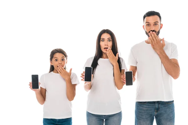 Surprised Parents Kid Holding Smartphones Blank Screens Isolated White — Stock Photo, Image