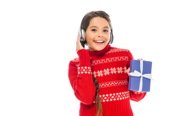 Cheerful Kid Sweater Holding Present Listening Music Headphones Isolated White — Stock Photo, Image