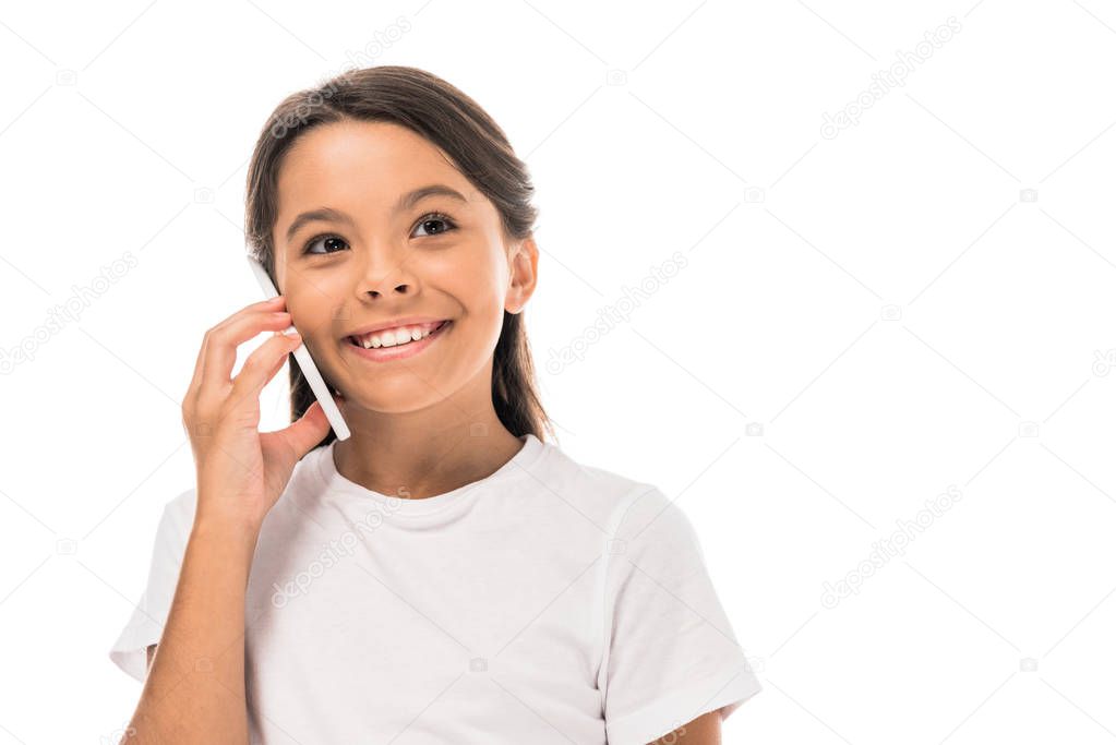 happy and cute kid talking on smartphone isolated on white 