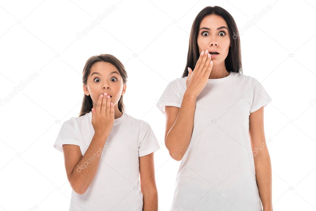 shocked mother and kid covering faces isolated on white 