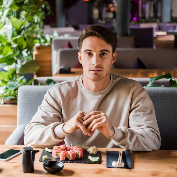 Handsome Man Sitting Sushi Bar Delicious Meal — Stock Photo, Image