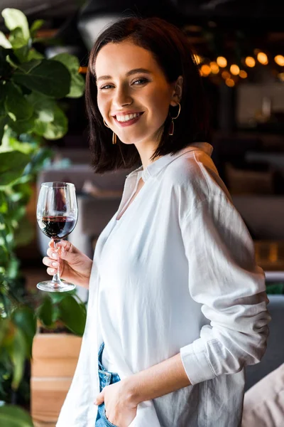 Cheerful Woman Standing Hand Pocket While Holding Glass Red Wine — Stock Photo, Image