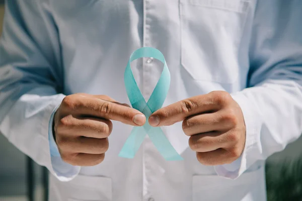 Partial View Doctor White Coat Holding Blue Awareness Ribbon — Stock Photo, Image
