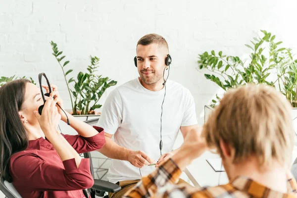 Selective Focus Broker Wearing Headset Coworkers Office — Stock Photo, Image