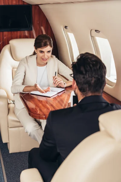 Selective Focus Businessman Businesswoman Talking Private Plane — Stock Photo, Image