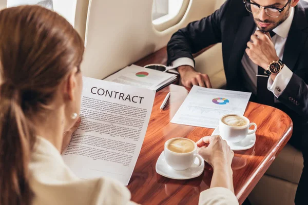 Selective Focus Businessman Looking Document Businesswoman Looking Contract Private Plane — Stock Photo, Image