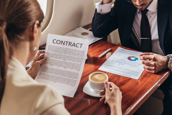 Selective Focus Businessman Looking Paper Businesswoman Looking Contract Private Plane — Stock Photo, Image