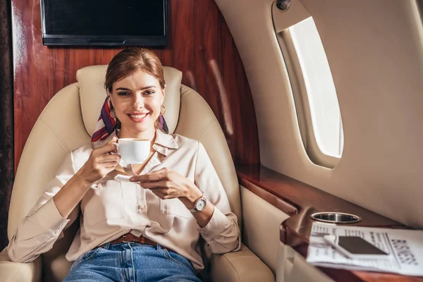 Smiling Woman Shirt Holding Cup Coffee Private Plane — Stock Photo, Image