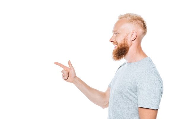 профиль портрет красивого бородатого мужчины, указывая изолированные на белый
