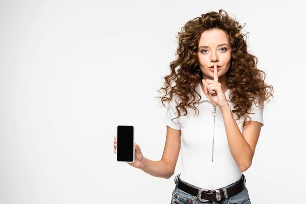 Curly Girl Showing Silence Symbol Smartphone Blank Screen Isolated White — Stock Photo, Image