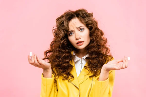 Dissatisfied Girl Holding Wireless Earphones Isolated Pink — Stock Photo, Image