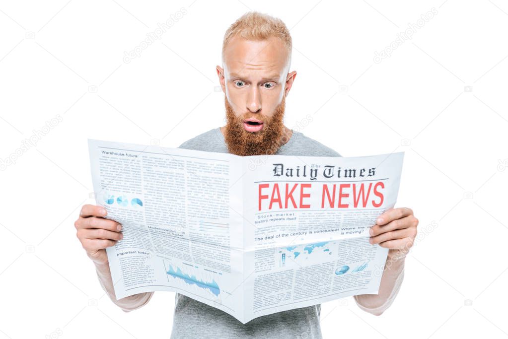 shocked bearded man reading newspaper with fake news, isolated on white