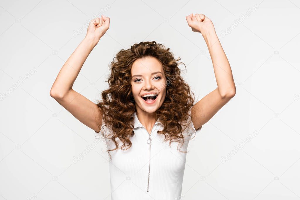 successful curly girl in white t-shirt, isolated on white