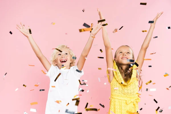 Smiling Kids Outstretched Hands Falling Confetti Pink Background — Stock Photo, Image