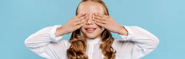 Panoramic Shot Smiling Kid Obscuring Face Isolated Blue — Stock Photo, Image