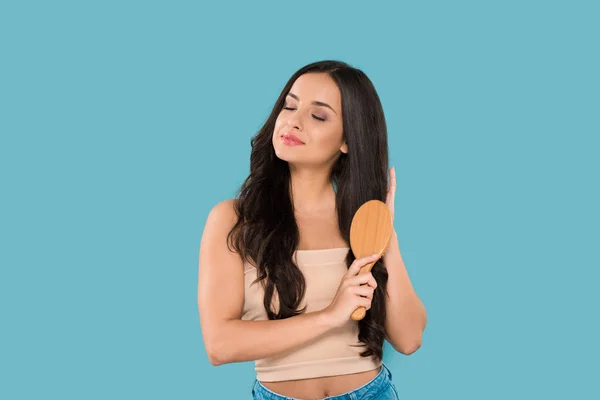 Happy Girl Brushing Shiny Hair Isolated Blue — Stock Photo, Image