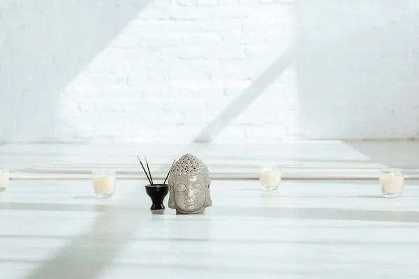 Decorative Buddha Head Aromatic Sticks Candles White Floor — Stock Photo, Image
