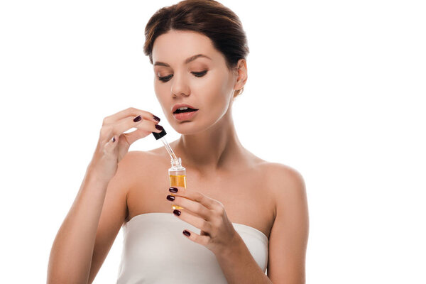 attractive woman holding pipette with serum isolated on white 