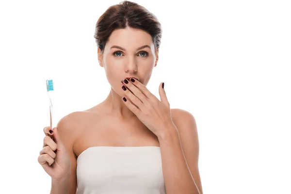 Shocked Woman Covering Mouth Holding Toothbrush Isolated White — Stock Photo, Image