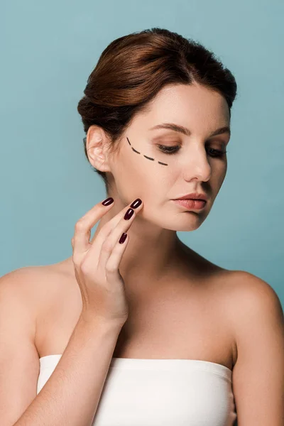 Attractive Woman Touching Face Marked Lines Isolated Blue — Stock Photo, Image