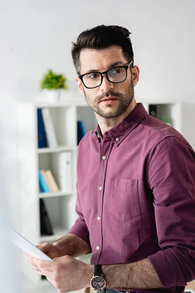 Selective Focus Serious Handsome Businessman Eyeglasses Looking Away While Holding — Stock Photo, Image