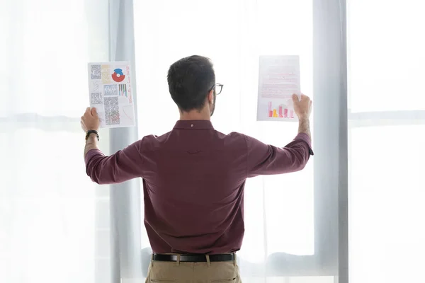 Back View Businessman Looking Documents While Standing Window — Stock Photo, Image