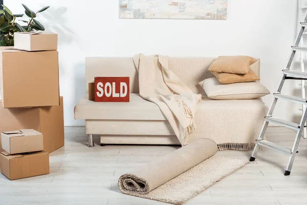 Nameplate Sold Lettering Couch Ladder Cardboard Boxes Living Room — Stock Photo, Image