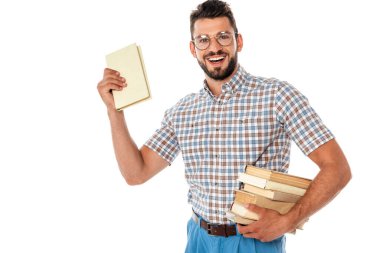 Cheerful nerd in eyeglasses holding books isolated on white clipart