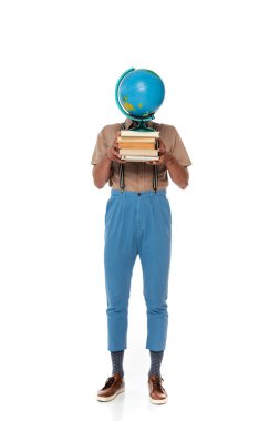 Nerd in suspenders holding globe and books near face on white background clipart