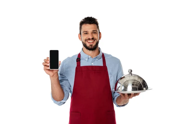 Smiling Waiter Apron Holding Smartphone Tray Cloche Isolated White — Stock Photo, Image