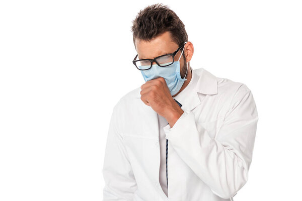 Sick doctor in medical mask coughing isolated on white