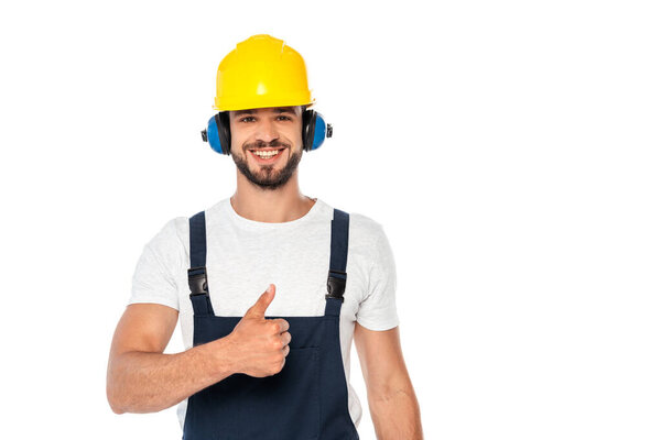 Handsome workman smiling and showing like gesture isolated on white
