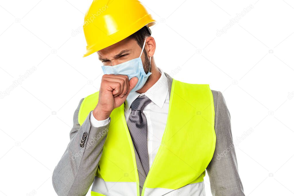 Sick engineer in medical mask coughing isolated on white
