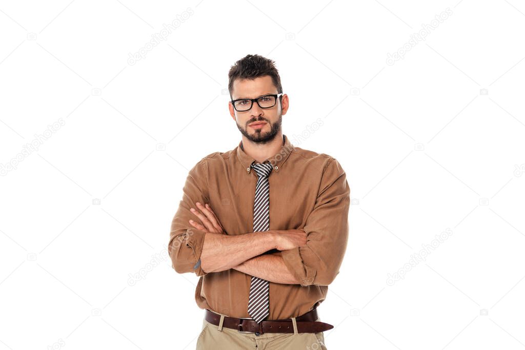 Serious teacher in eyeglasses with crossed arms looking at camera isolated on white