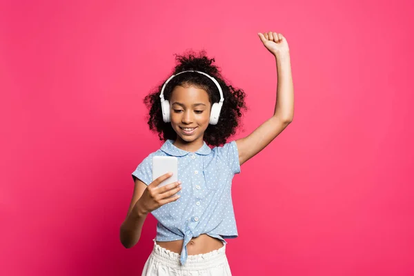 Smiling Curly African American Kid Headphones Using Smartphone Raised Hand — Stock Photo, Image