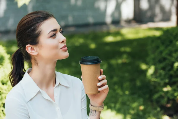 Beautiful Businesswoman Holding Paper Cup Looking Away — Stock Photo, Image