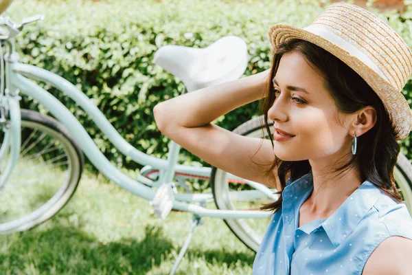 Attractive Woman Touching Straw Hat Bicycle — Stock Photo, Image