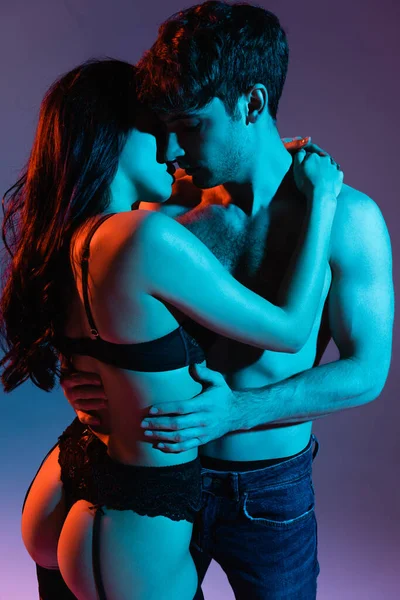 Sexy Couple Kissing Hugging Purple — Stock Photo, Image