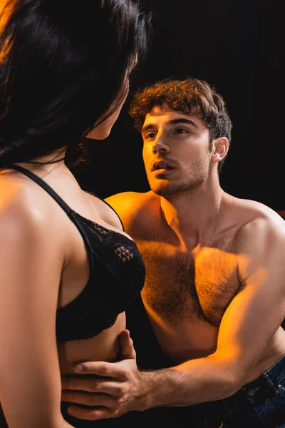 Muscular Man Touching Looking Sexy Woman Lace Bra Isolated Black — Stock Photo, Image