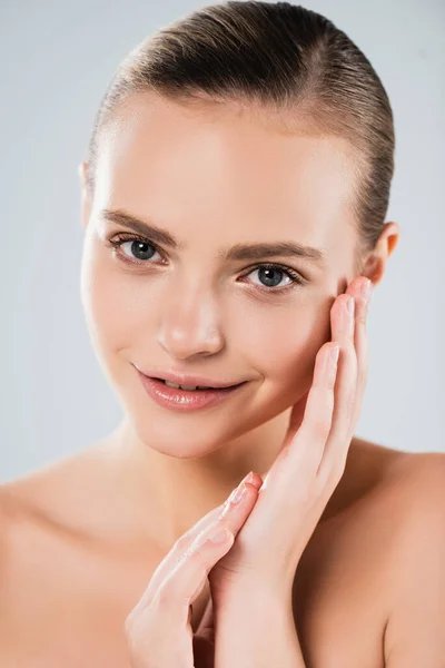 Happy Young Woman Looking Camera Touching Face Isolated Grey — Stock Photo, Image