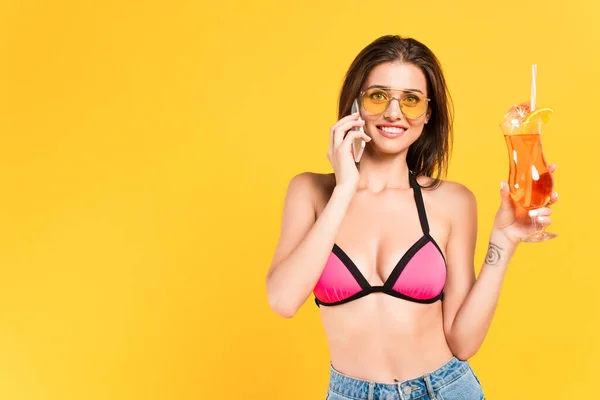 Happy Girl Sunglasses Talking Smartphone Holding Cocktail Isolated Yellow — Stock Photo, Image