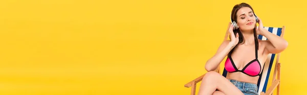Panoramic Shot Happy Girl Swimsuit Headphones Sitting Deck Chair Yellow — Stock Photo, Image