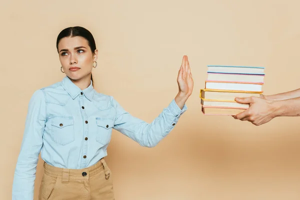 Ledsen Student Denim Skjorta Visar Stopp Gest Nära Böcker Beige — Stockfoto