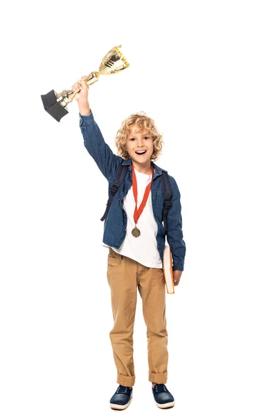 Kudrnatý Školák Zlatou Medailí Drží Trofej Knihy Izolované Bílém — Stock fotografie