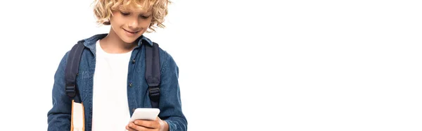 Panoramic Concept Blonde Curly Schoolboy Holding Book Using Smartphone Isolated — Stock Photo, Image
